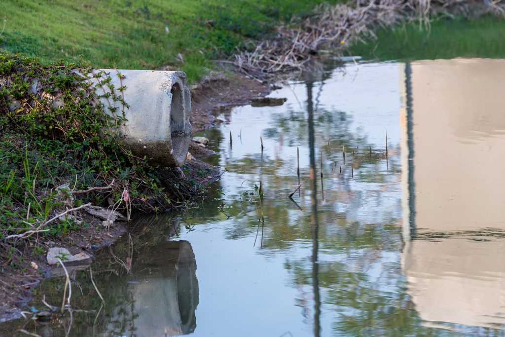 how storm drains pollute HOA lakes